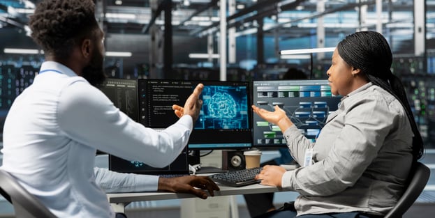 Ontrac engineers working through a live deployment